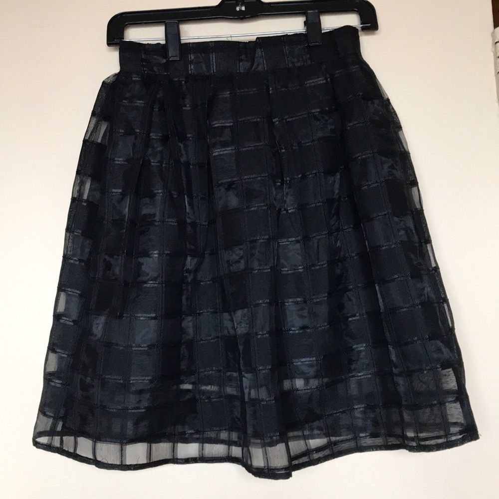 A cute black skirt patterned
